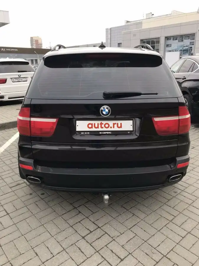 Фото автомобиля BMW X5, 2012 — госномер Н863ОН134. Цвет: Белый