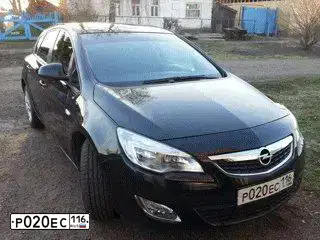 Фото автомобиля OPEL ASTRA, 2012 — госномер У282КК716. Цвет: ЧЕРНЫЙ МЕТАЛЛИК