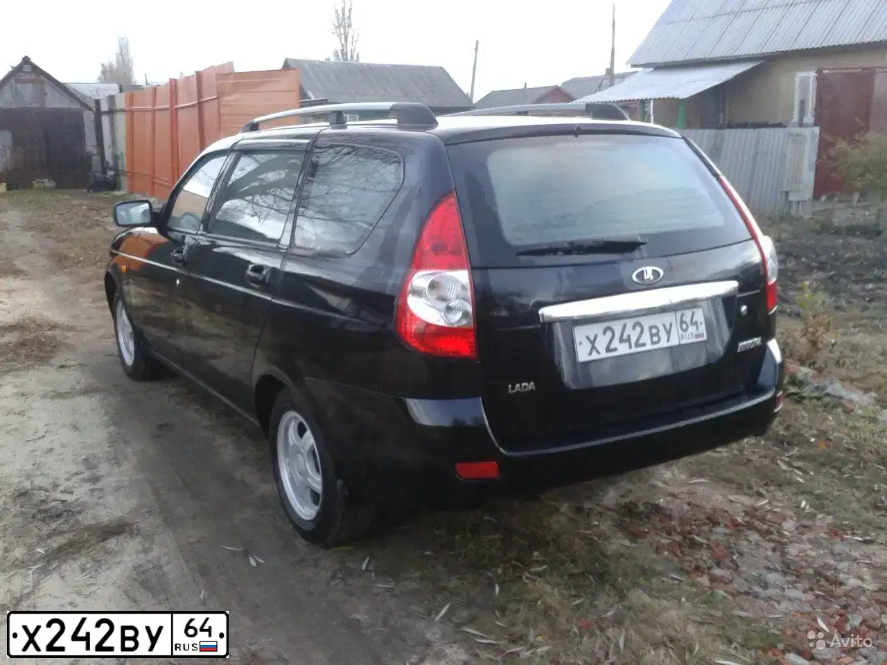 Фото автомобиля LADA 2114 SAMARA, 2010 — госномер Х424ВУ64. Цвет: ЧЕРНЫЙ