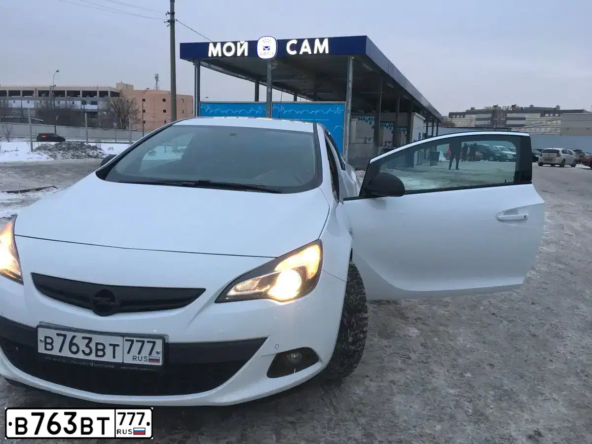 Фото автомобиля OPEL ASTRA, 2014 — госномер Р055ВР152. Цвет: Белый