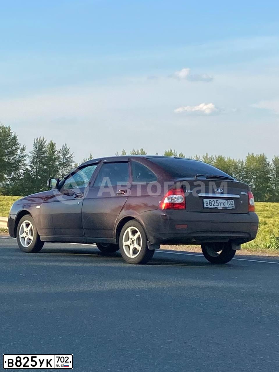 Фото автомобиля LADA 2172 PRIORA, 2011 — госномер Е036МО702. Цвет: ТЕМНО-ВИШНЕВЫЙ