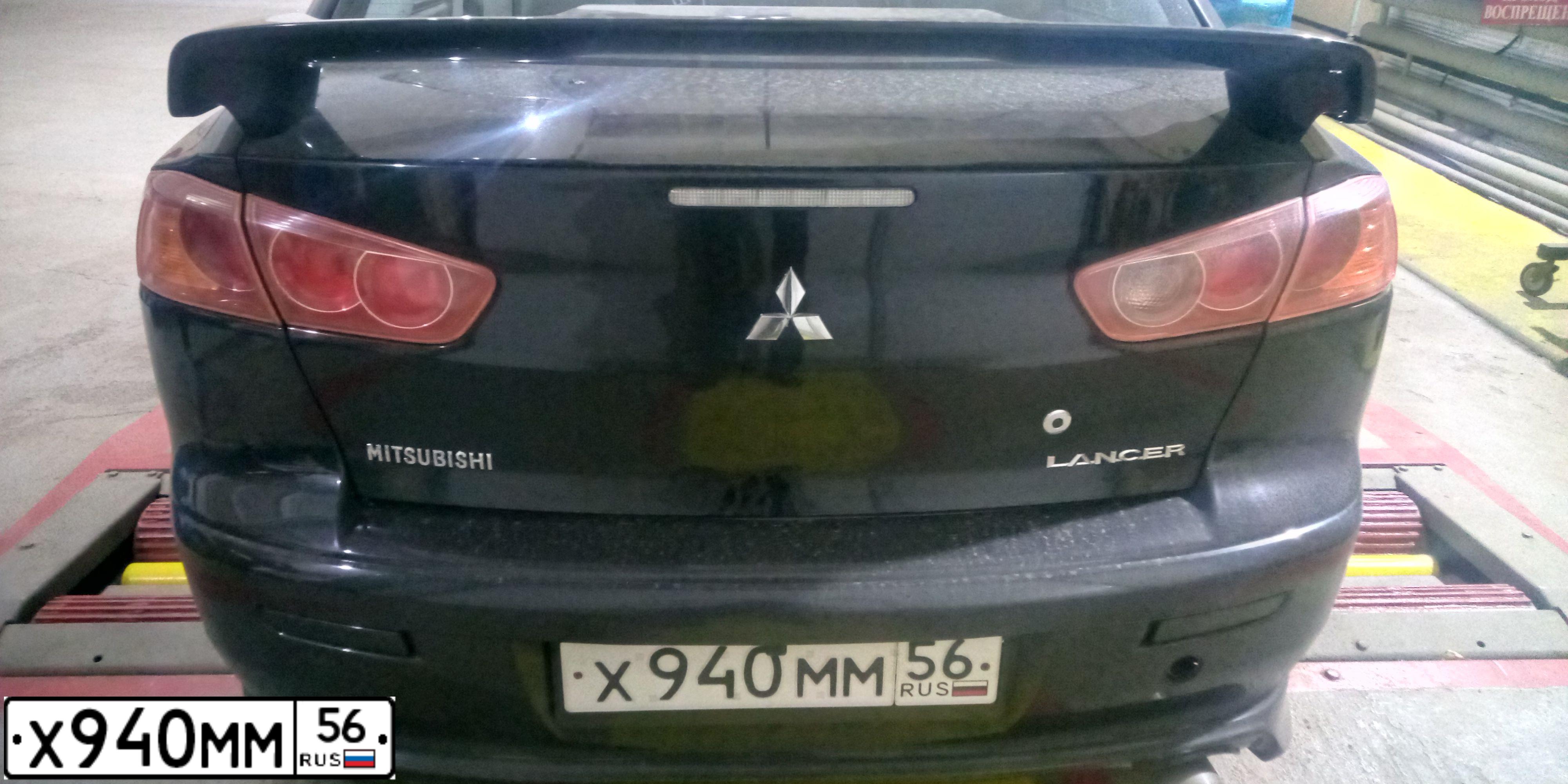 Фото автомобиля MITSUBISHI LANCER, 2008 — госномер Х940ММ56. Цвет: ЧЕРНЫЙ