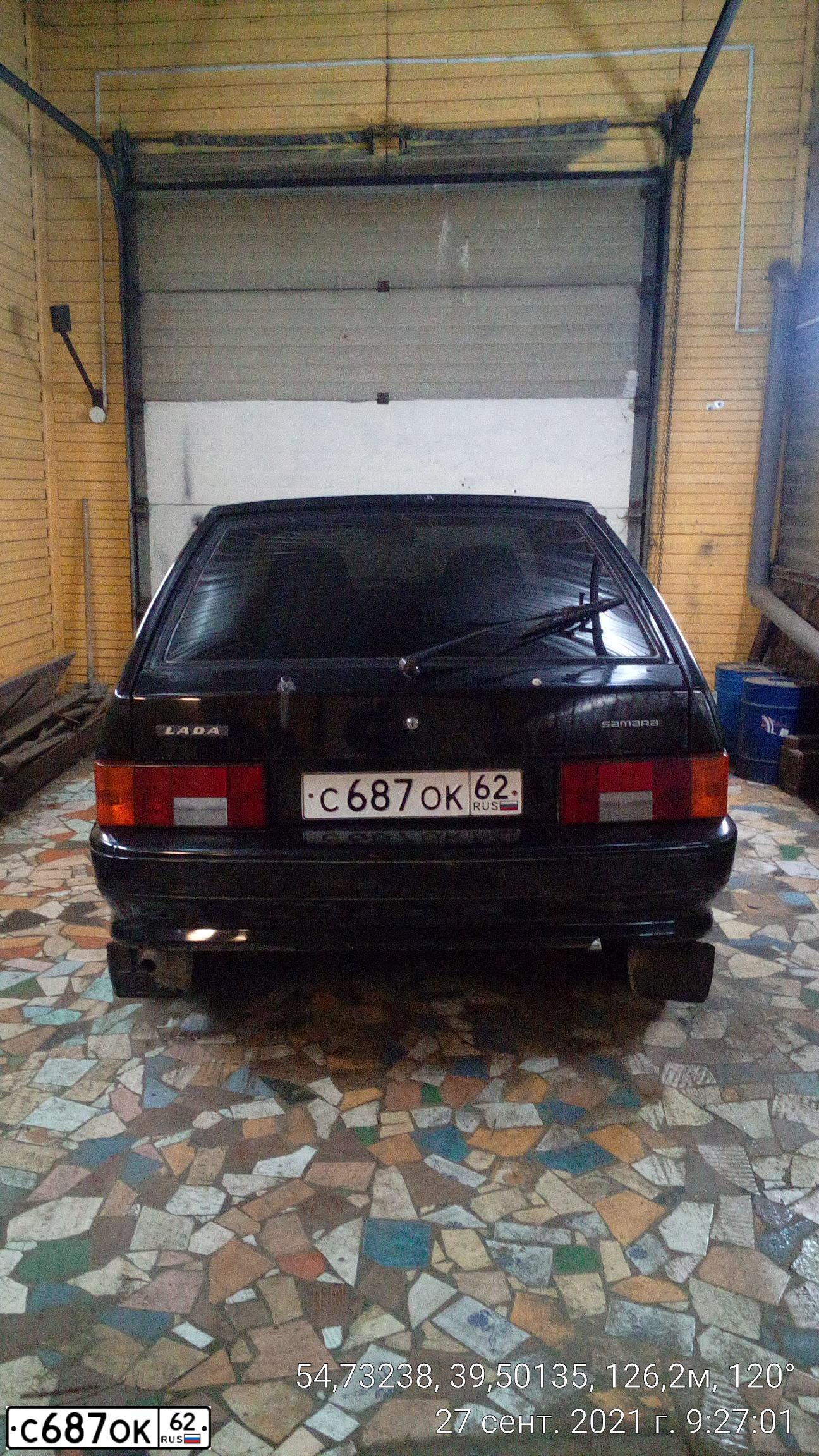 Фото автомобиля LADA 2114 SAMARA, 2010 — госномер С687ОК62. Цвет: Темно-зеленый