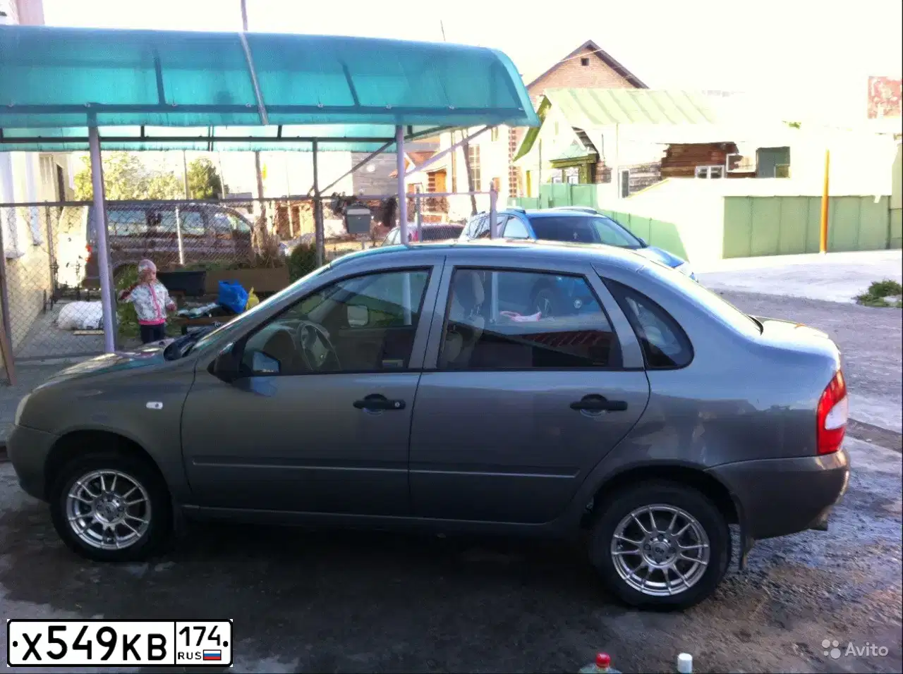 Фото автомобиля LADA KALINA, 2010 — госномер К852НЕ45. Цвет: ТЕМНО-СЕРЫЙ