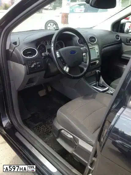Фото автомобиля FORD D FOCUS, 2009 — госномер С100ЕН152. Цвет: ЧЕРНЫЙ