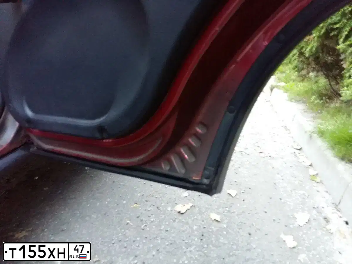 Фото автомобиля MITSUBISHI LANCER, 2004 — госномер Т155ХН47. Цвет: СЕРЕБРИСТЫЙ