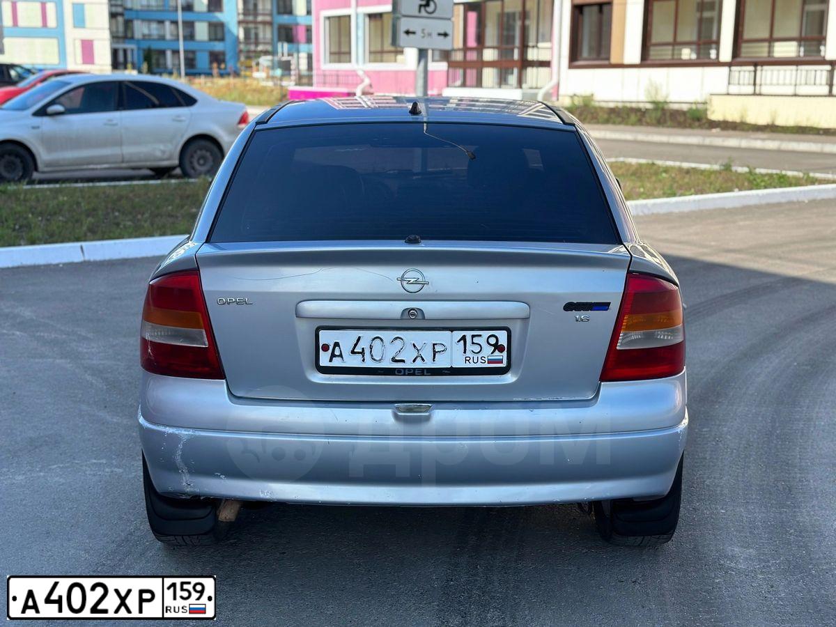 Фото автомобиля OPEL ASTRA, 1999 — госномер О815ХА159. Цвет: СЕРЕБРИСТЫЙ