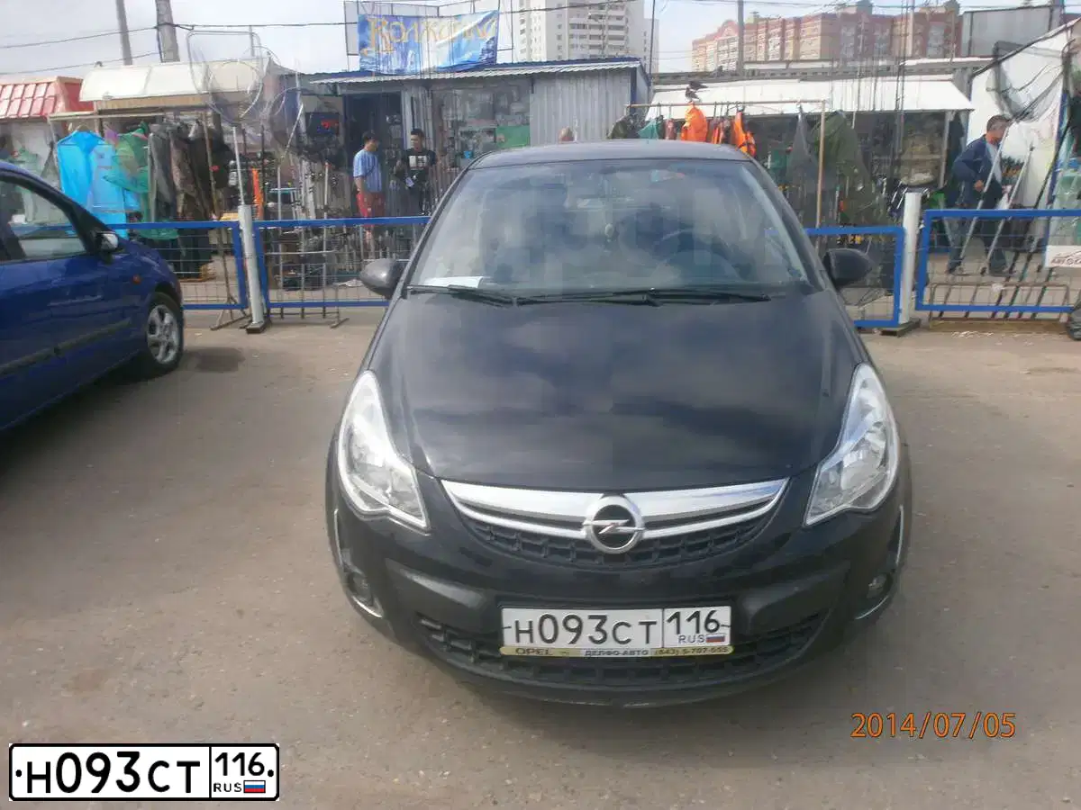 Фото автомобиля OPEL CORSA, 2011 — госномер Н093СТ116. Цвет: ЧЕРНЫЙ