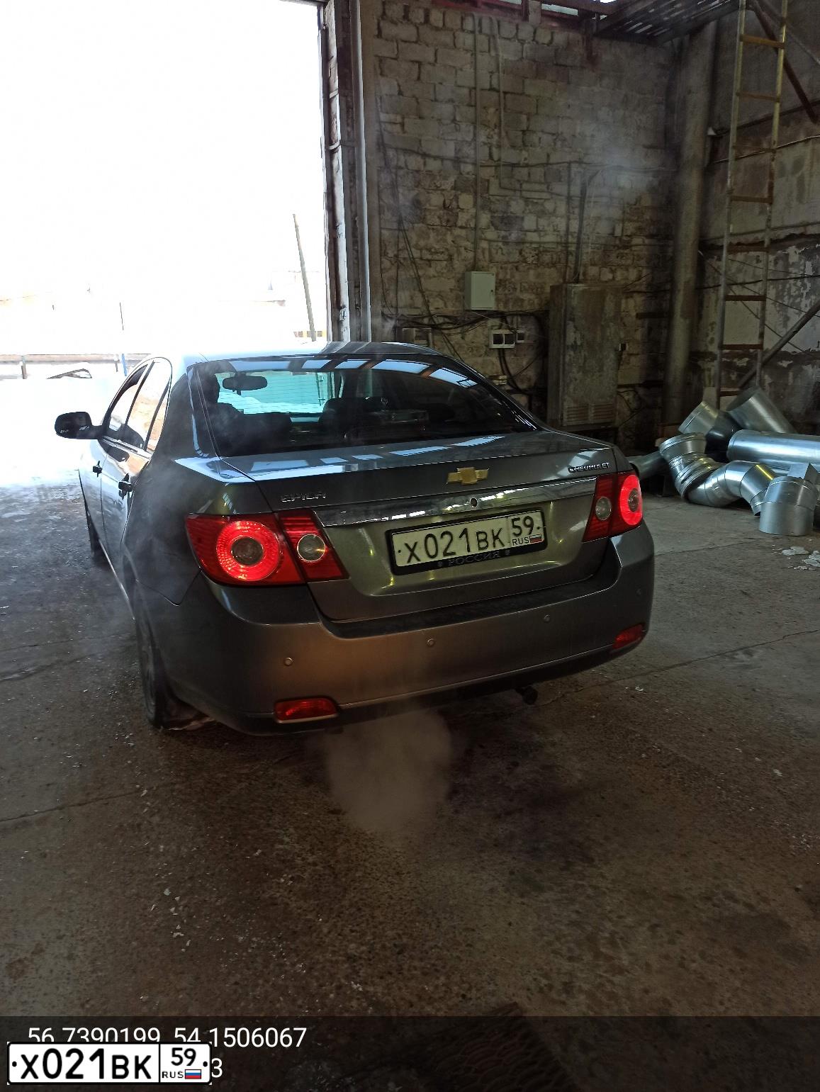 Фото автомобиля CHEVROLET EPICA, 2007 — госномер Х021ВК59. Цвет: СЕРЫЙ