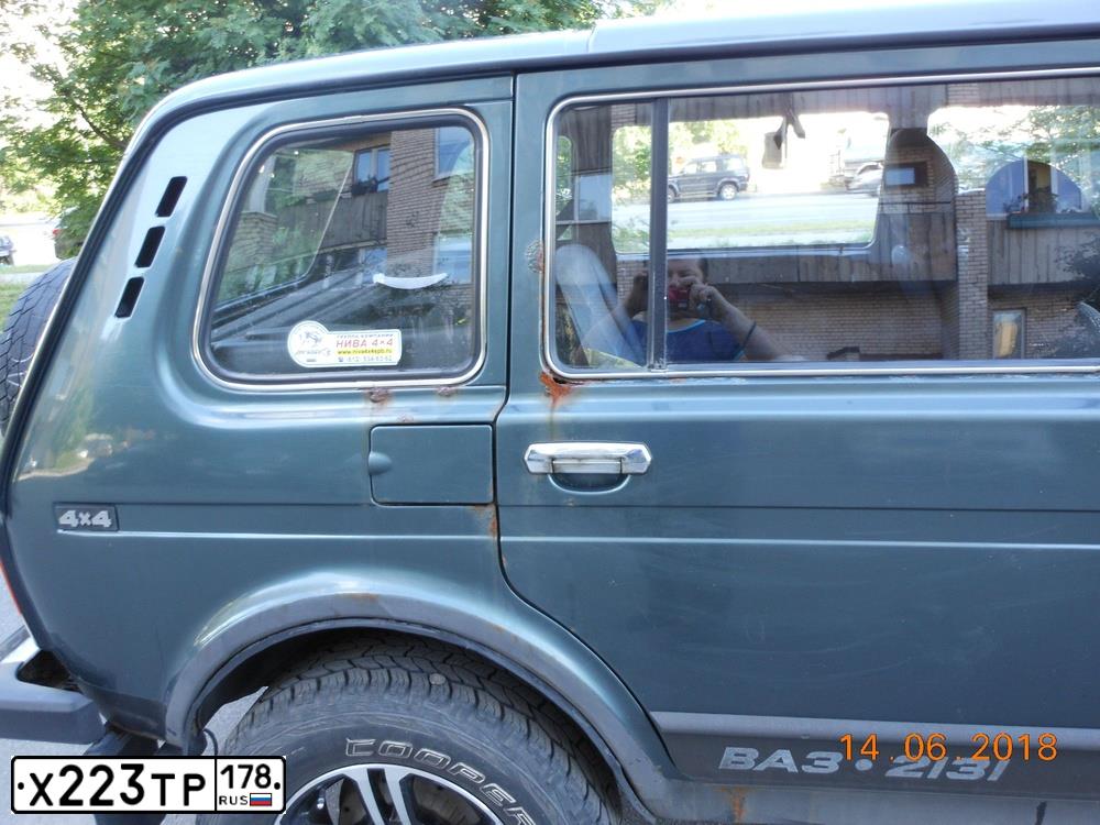 Фото автомобиля LADA 2131 NIVA, 2011 — госномер Е707КВ178. Цвет: СЕРО-СИНЕ-ЗЕЛЕНЫЙ