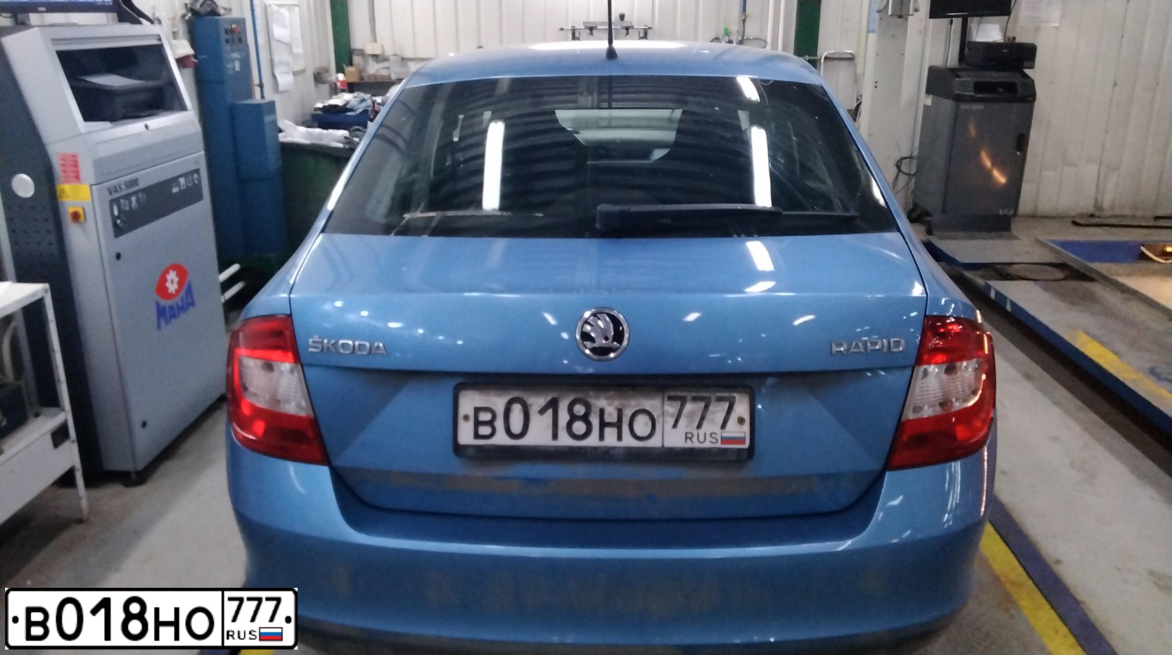 Фото автомобиля SKODA RAPID, 2015 — госномер Е409СХ790. Цвет: синий