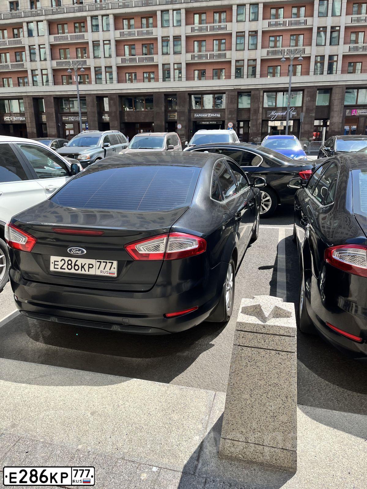 Фото автомобиля FORD MONDEO, 2013 — госномер Е286КР777. Цвет: ЧЕРНЫЙ