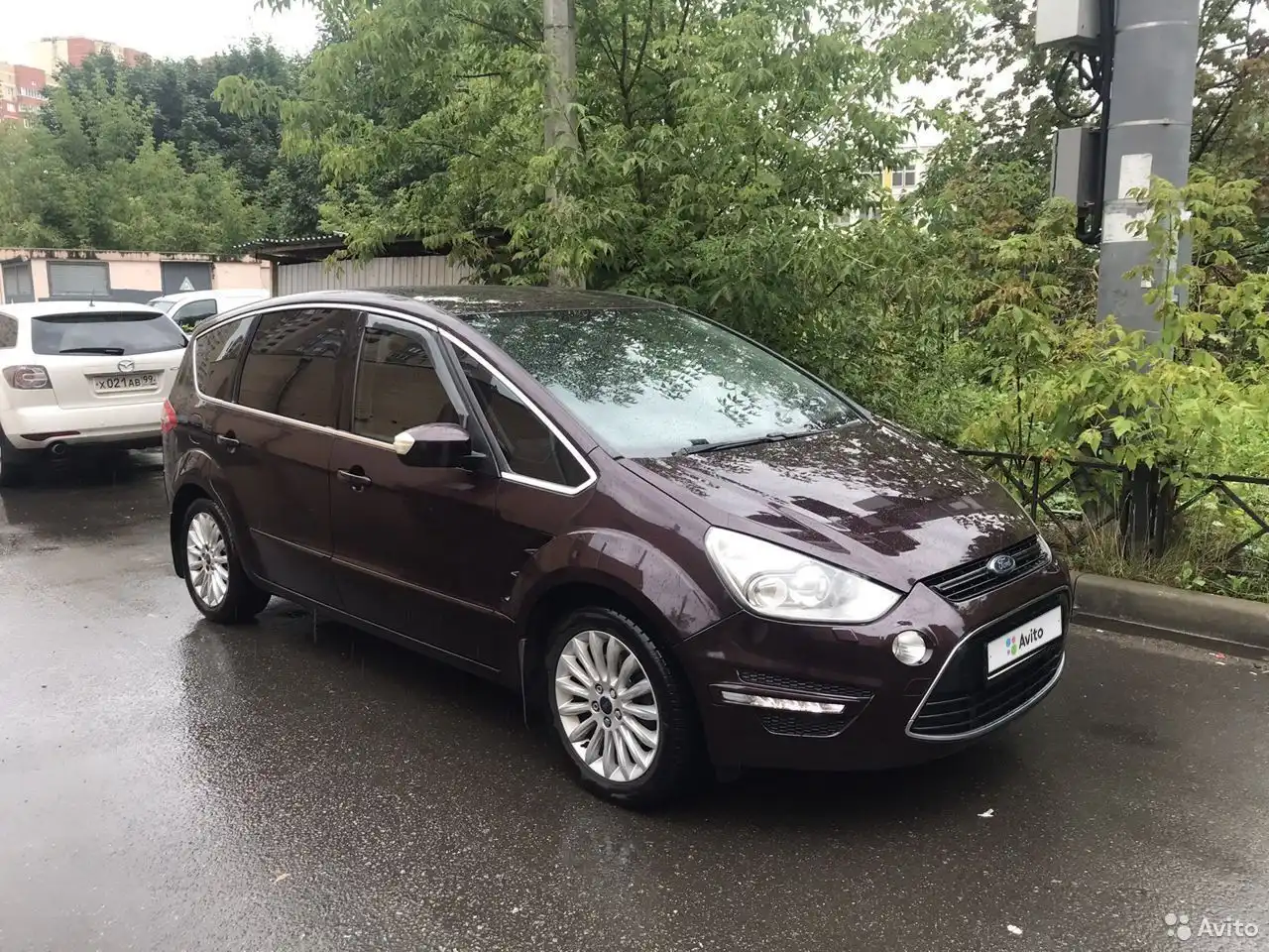 Фото автомобиля MAZDA CX-7, 2011 — госномер Х021АВ99. Цвет: Белый
