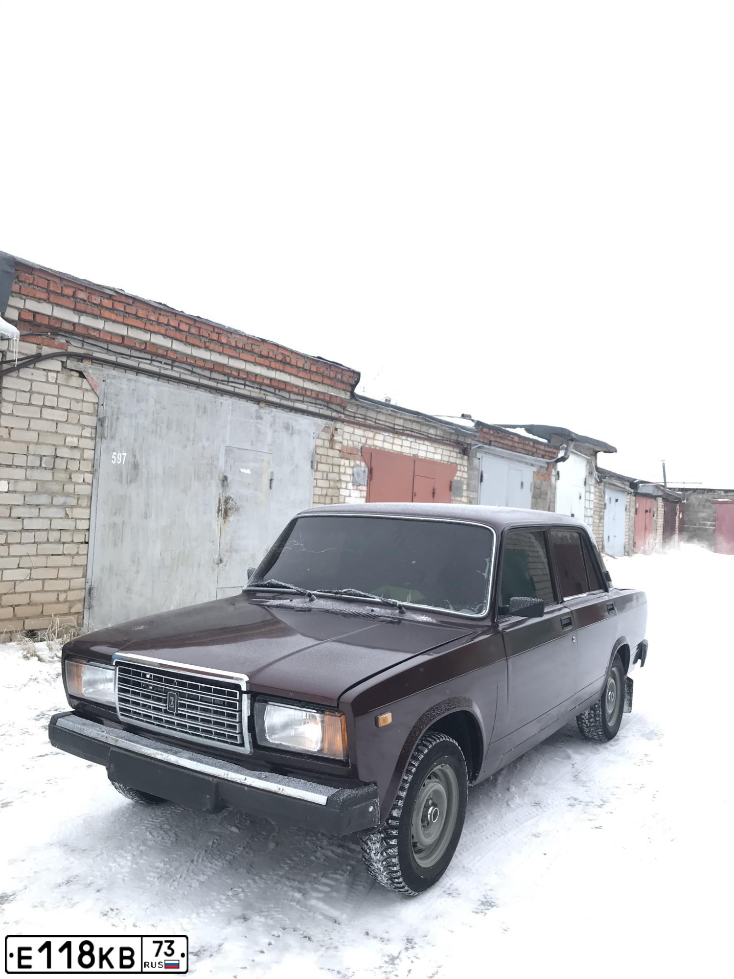 Фото автомобиля LADA 2107 LADA, 2010 — госномер Е118КВ73. Цвет: ТЕМНО-ВИШНЕВЫЙ