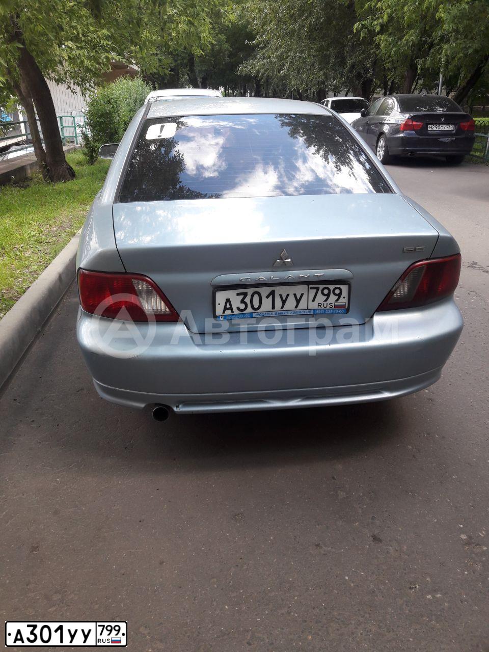 Фото автомобиля MITSUBISHI GALANT, 2003 — госномер А301УУ799. Цвет: голубой