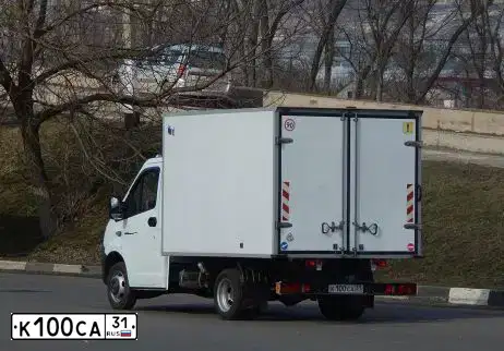 Фото автомобиля LADA 2121 NIVA, 2012 — госномер К100СА31. Цвет: Темно-зеленый