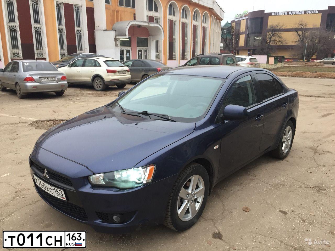 Фото автомобиля MITSUBISHI LANCER, 2004 — госномер Т011СН163. Цвет: СЕРЕБРИСТЫЙ