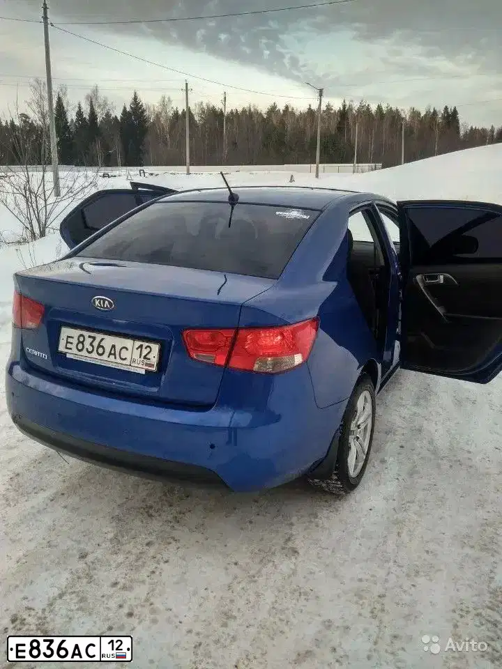 Фото автомобиля KIA CERATO, 2010 — госномер Н216ТХ62. Цвет: синий