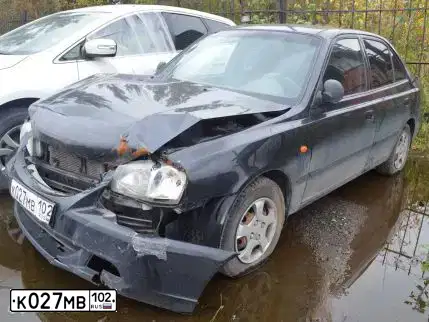 Фото автомобиля TAGAZ ACCENT, 2008 — госномер К027МВ102. Цвет: ЧЕРНЫЙ