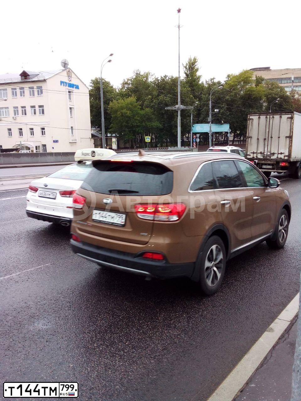 Фото автомобиля KIA SORENTO, 2016 — госномер Т144ТМ799. Цвет: Коричневый