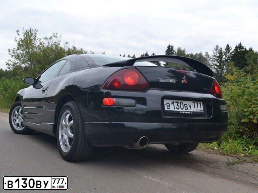 Фото автомобиля MITSUBISHI ECLIPSE, 2001 — госномер В130ВУ777. Цвет: ЧЕРНЫЙ