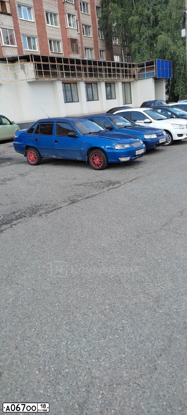Фото автомобиля DAEWOO NEXIA, 2011 — госномер А067ОО18. Цвет: сине-глазуристый