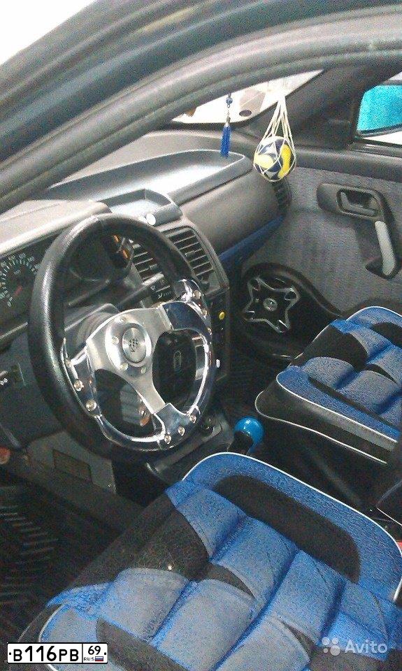 Фото автомобиля LADA 2112, 2002 — госномер Е155СЕ69. Цвет: Темно-зеленый