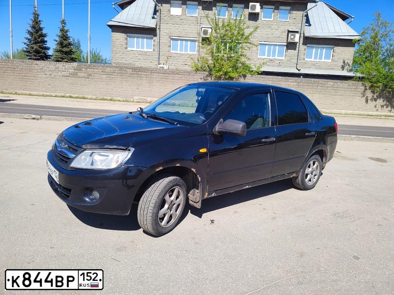 Фото автомобиля LADA 2190 GRANTA, 2012 — госномер К844ВР152. Цвет: Сине-Черный