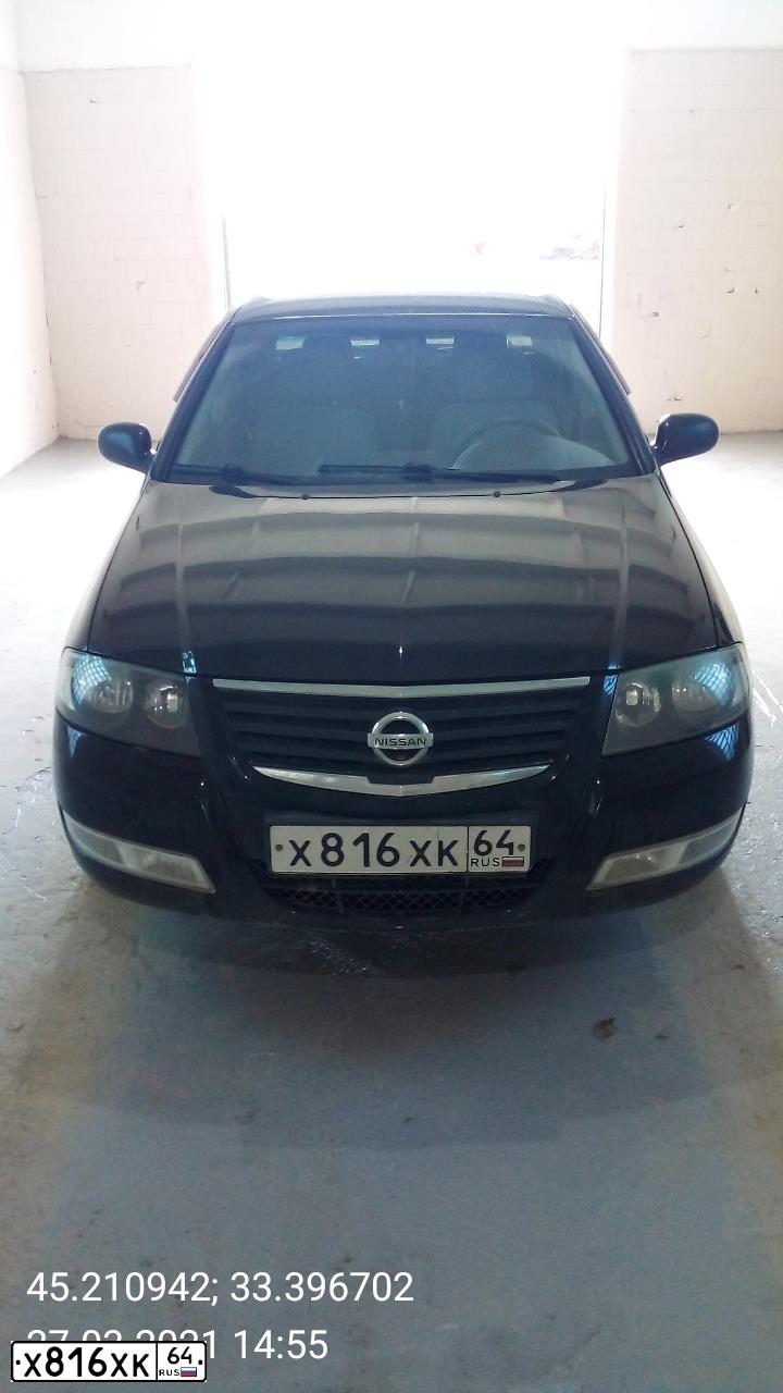 Фото автомобиля NISSAN ALMERA, 2012 — госномер Н716АУ82. Цвет: ЧЕРНЫЙ