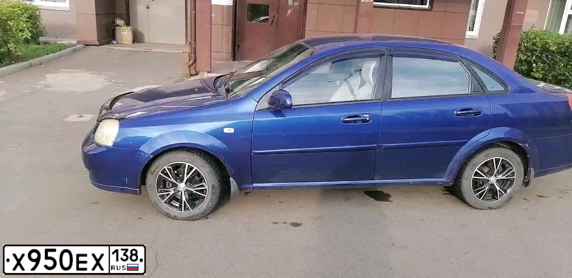 Фото автомобиля CHEVROLET LACETTI, 2006 — госномер Х950ЕХ138. Цвет: синий