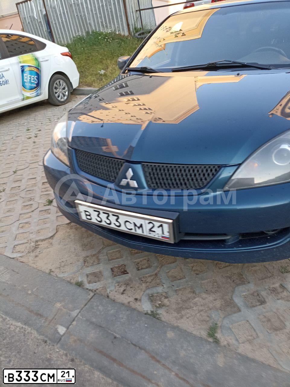 Фото автомобиля MITSUBISHI LANCER, 2006 — госномер В333СМ21. Цвет: синий