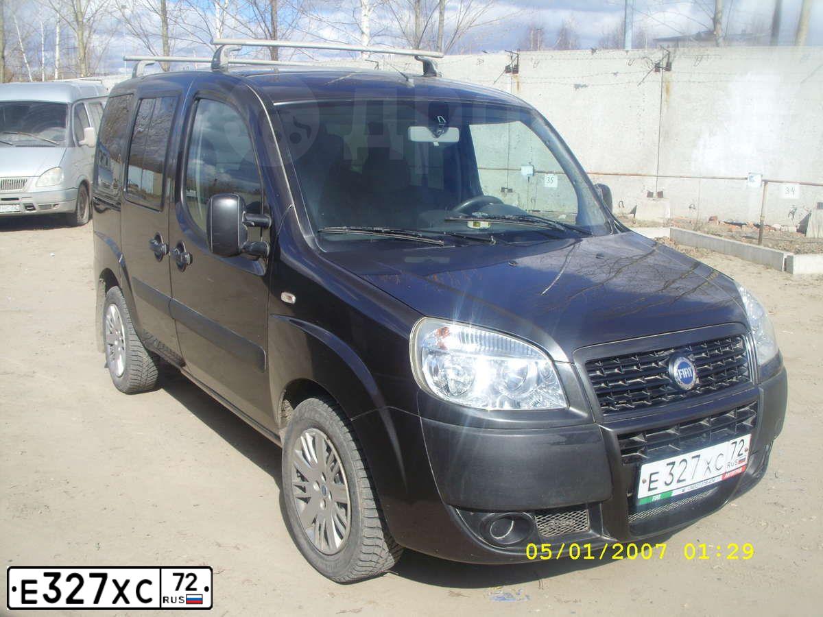 Фото автомобиля FIAT DOBLO, 2008 — госномер Н101УО702. Цвет: СЕРЫЙ