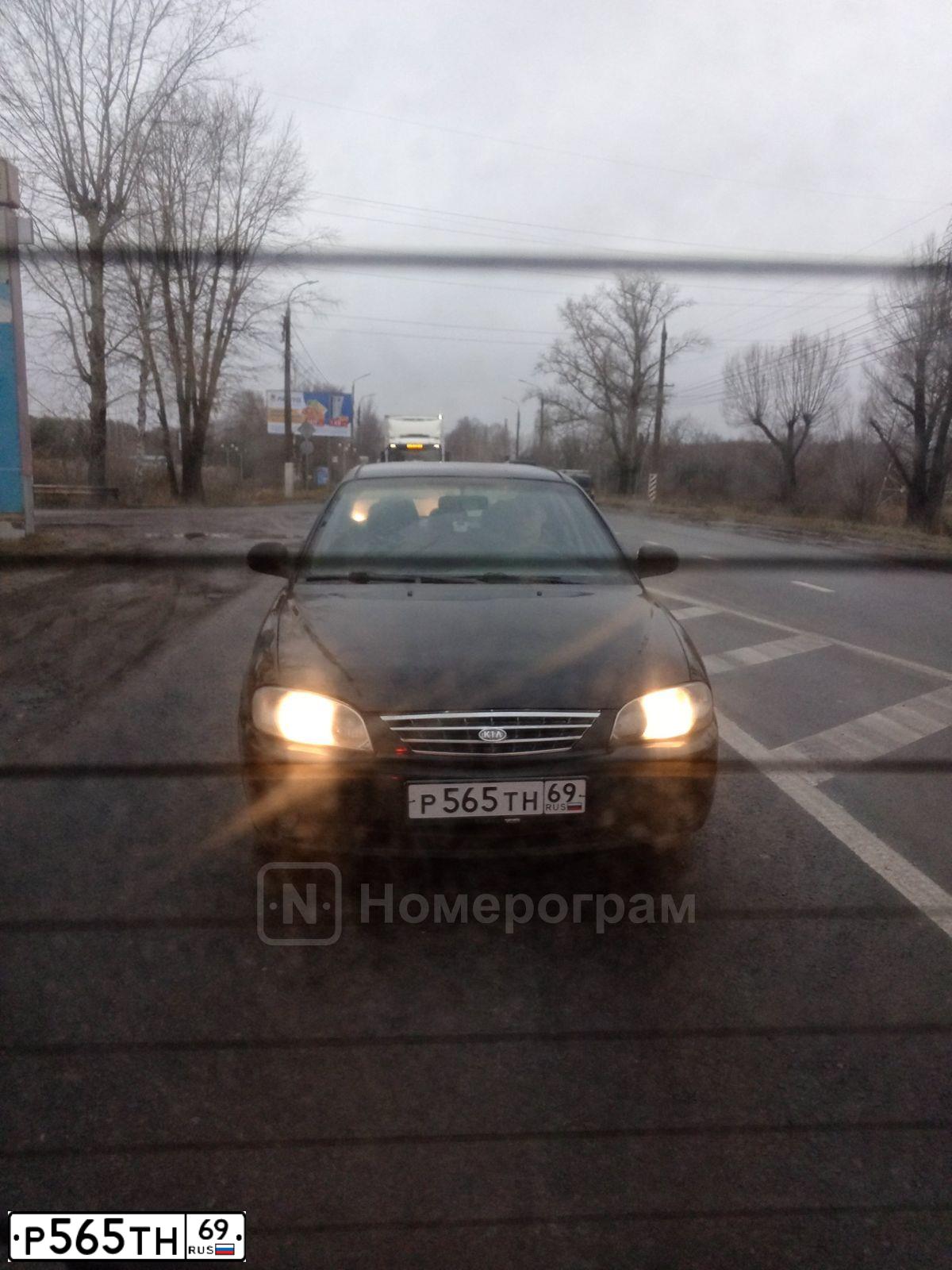 Фото автомобиля KIA SPECTRA, 2007 — госномер Р565ТН69. Цвет: ЧЕРНЫЙ
