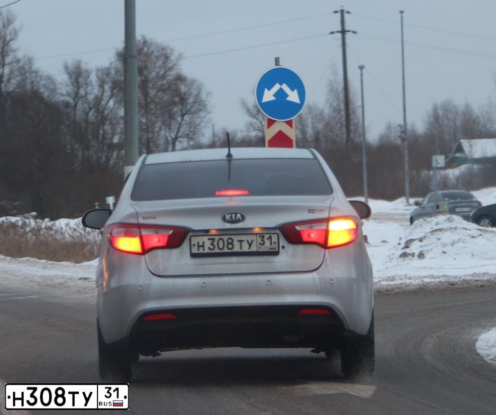 Фото автомобиля KIA RIO, 2014 — госномер Н308ТУ31. Цвет: СЕРЕБРИСТЫЙ