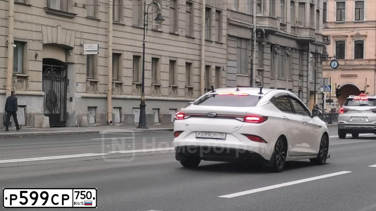 Фото автомобиля NISSAN ALMERA /AVTOVAZ/, 2018 — госномер Р599СР750. Цвет: Темно-синий