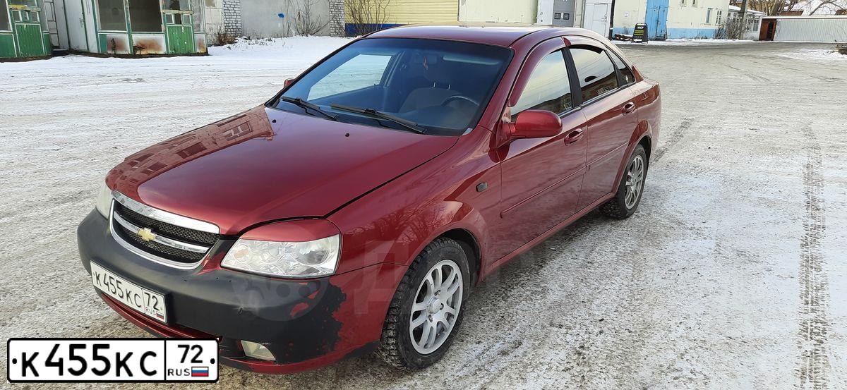 Фото автомобиля CHEVROLET LACETTI, 2007 — госномер К455КС72. Цвет: Красный