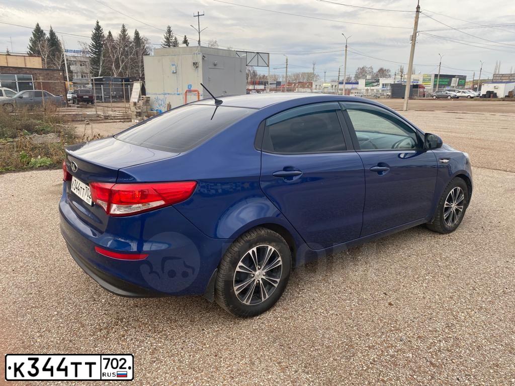 Фото автомобиля KIA RIO, 2016 — госномер Н004КС02. Цвет: синий
