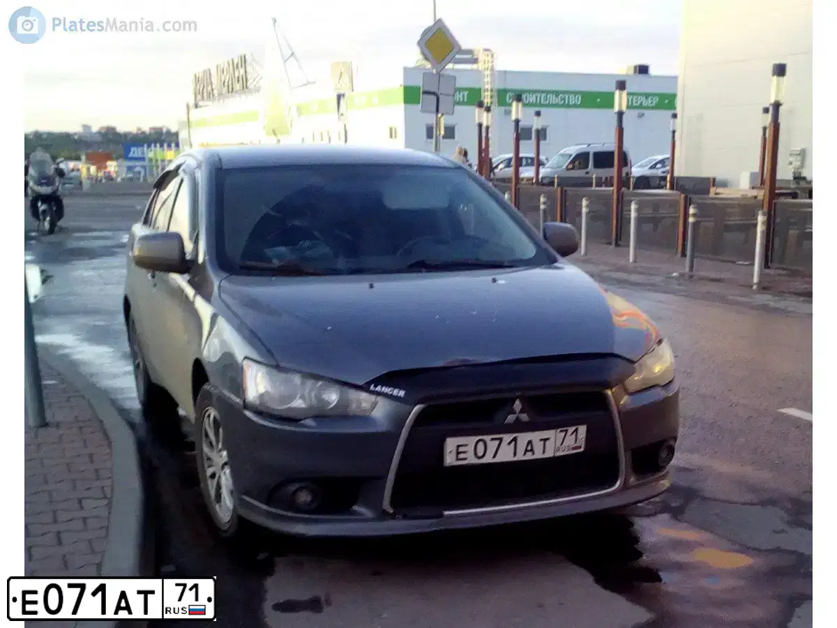 Фото автомобиля MITSUBISHI LANCER, 2011 — госномер У693УР57. Цвет: СЕРЫЙ