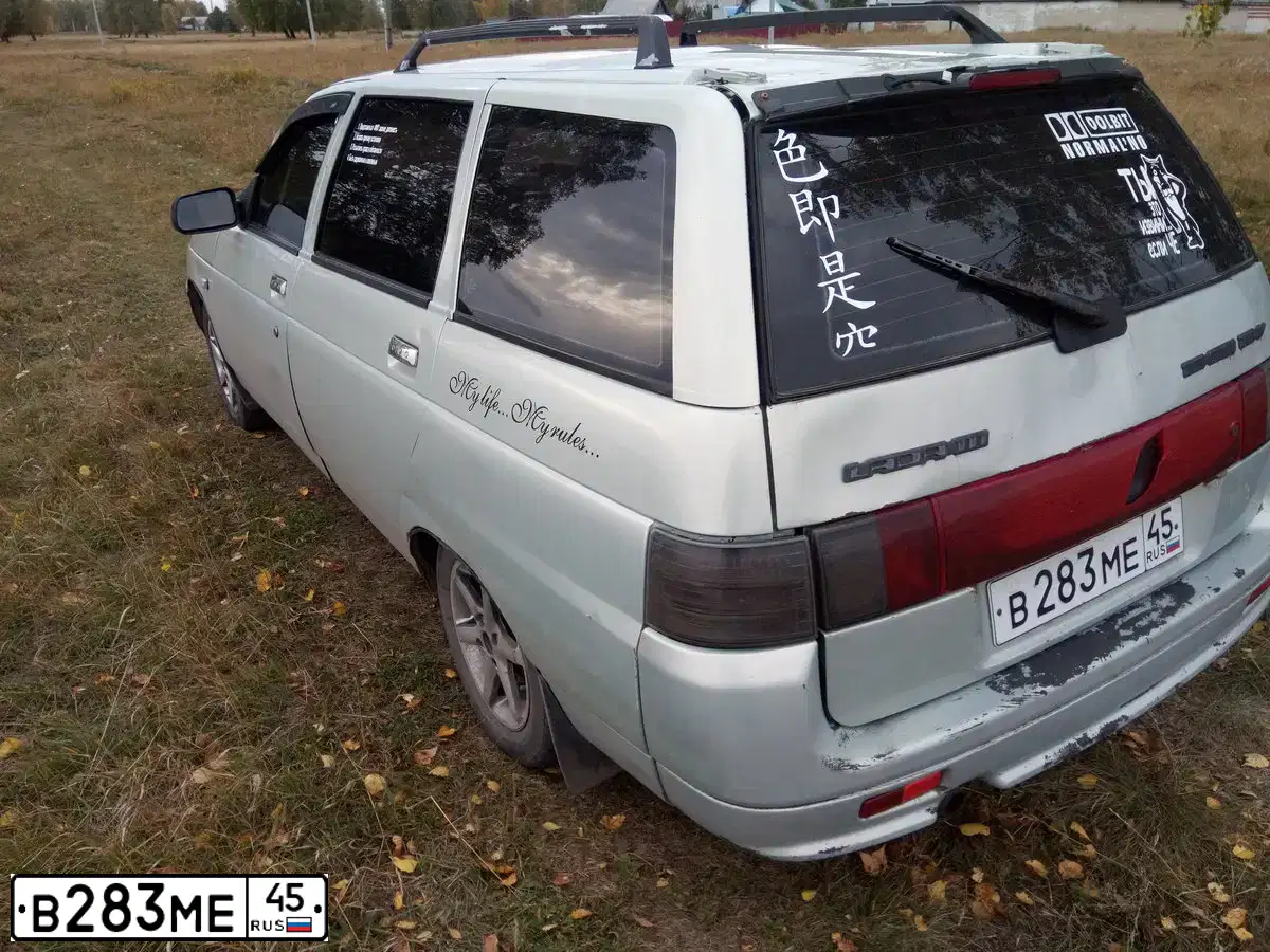 Фото автомобиля LADA 2111, 2001 — госномер У162ЕН45. Цвет: СЕРЕБРИСТЫЙ ЖЕЛТО-ЗЕЛЕНЫЙ