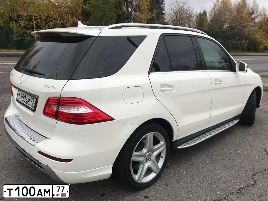 Фото автомобиля MERCEDES M-KLASSE, 2012 — госномер Т100АМ77. Цвет: Белый