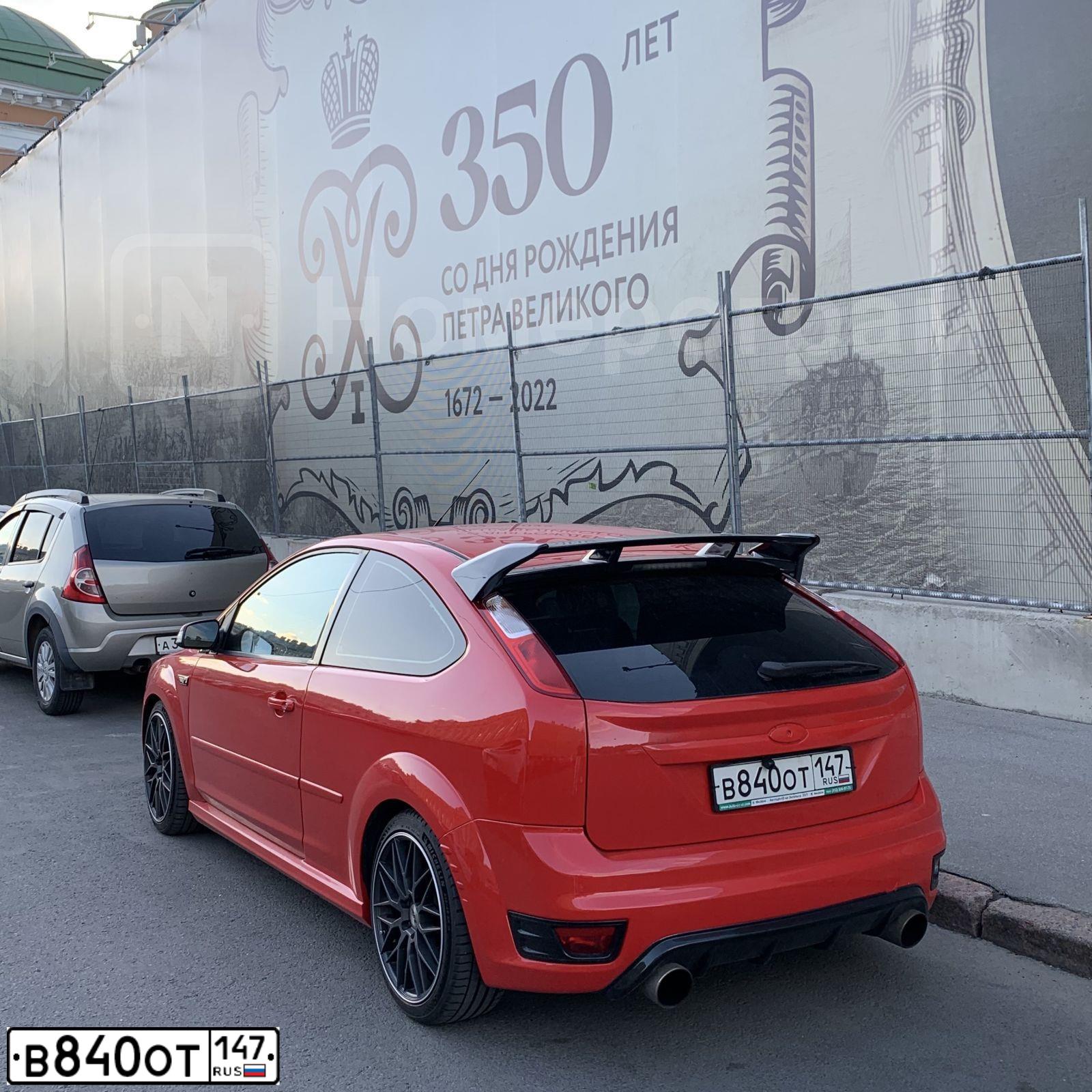 Фото автомобиля FORD D FOCUS, 2006 — госномер С456ТО198. Цвет: Красный