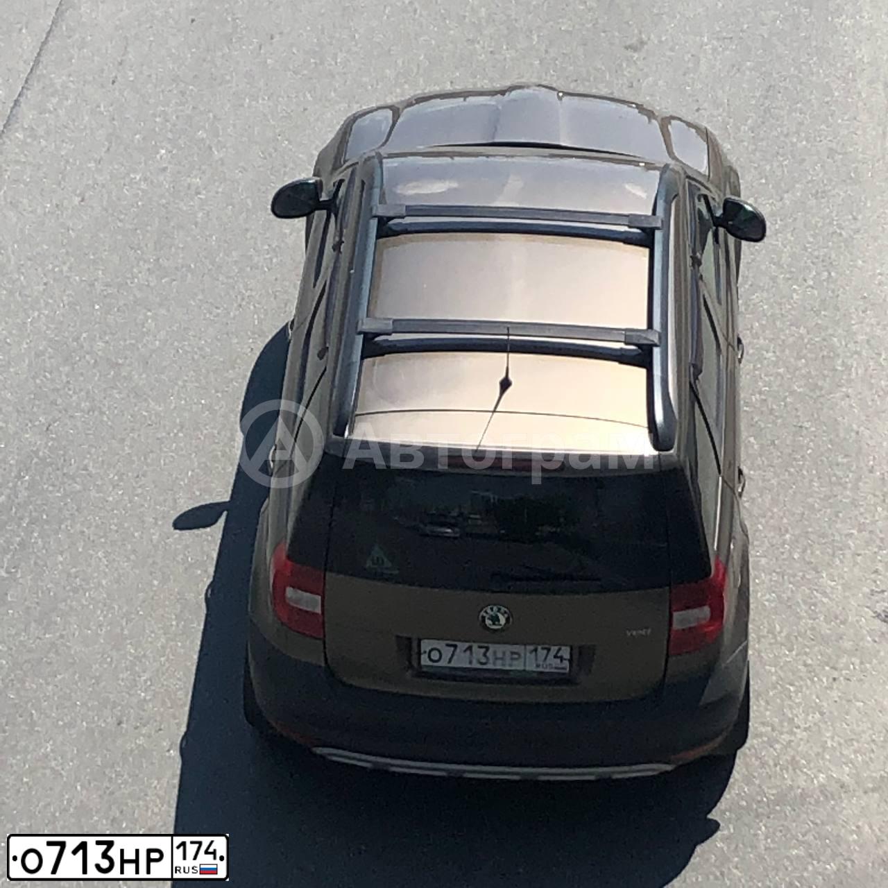 Фото автомобиля SKODA YETI, 2011 — госномер А671ВТ774. Цвет: Коричневый
