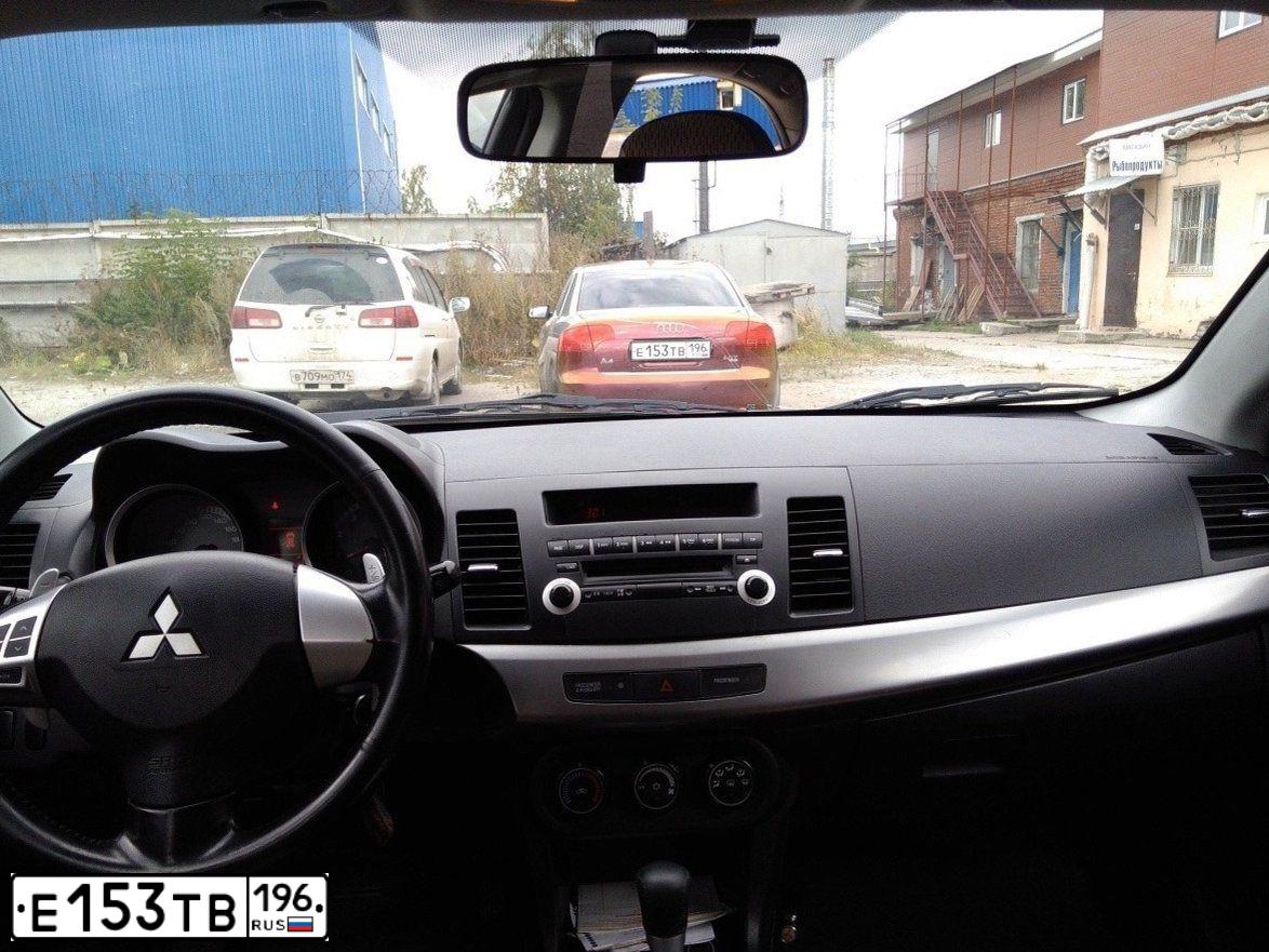 Фото автомобиля AUDI A4, 2006 — госномер А128СК51. Цвет: Зелено-Оранжевый