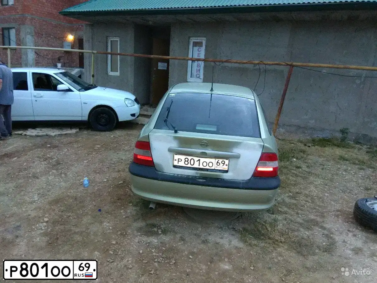 Фото автомобиля OPEL VECTRA, 1997 — госномер Р801ОО69. Цвет: СВЕТЛО-ЗЕЛЕНЫЙ