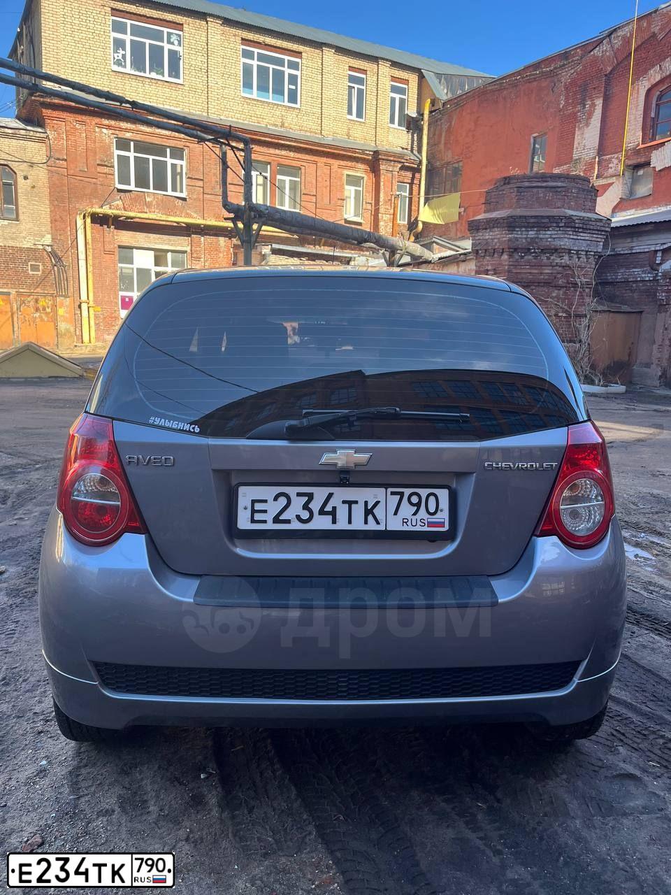 Фото автомобиля CHEVROLET AVEO, 2009 — госномер Е234ТК790. Цвет: СВЕТЛО-СЕРЫЙ