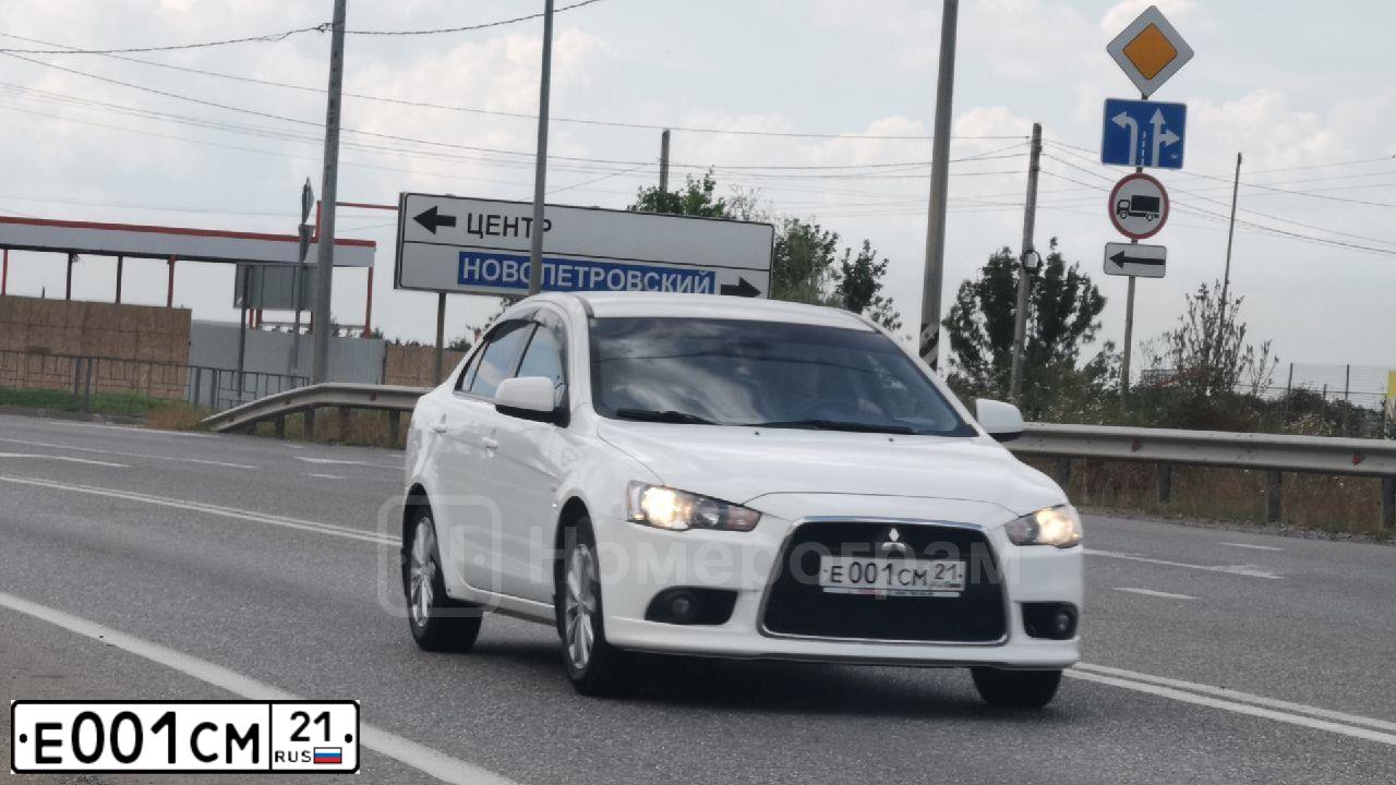 Фото автомобиля LADA 2104 LADA, 2006 — госномер Н001ЕА21. Цвет: СИНИЙ КАЛИПСО