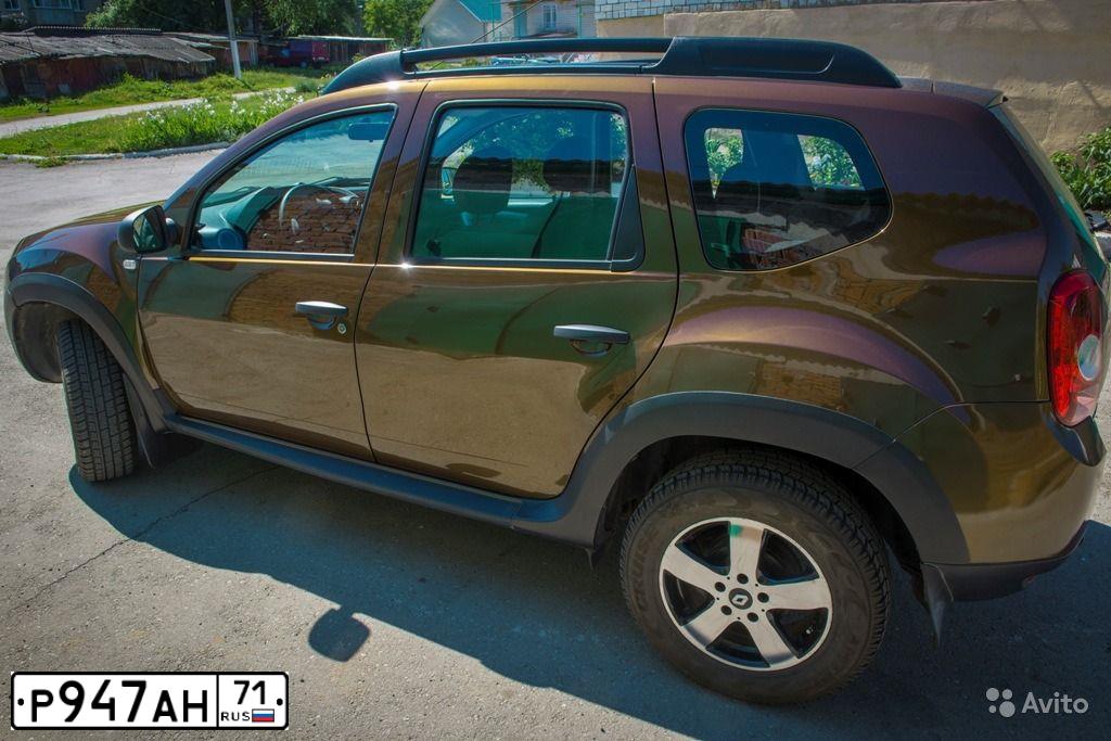 Фото автомобиля RENAULT DUSTER, 2013 — госномер Р916ХС71. Цвет: Коричневый
