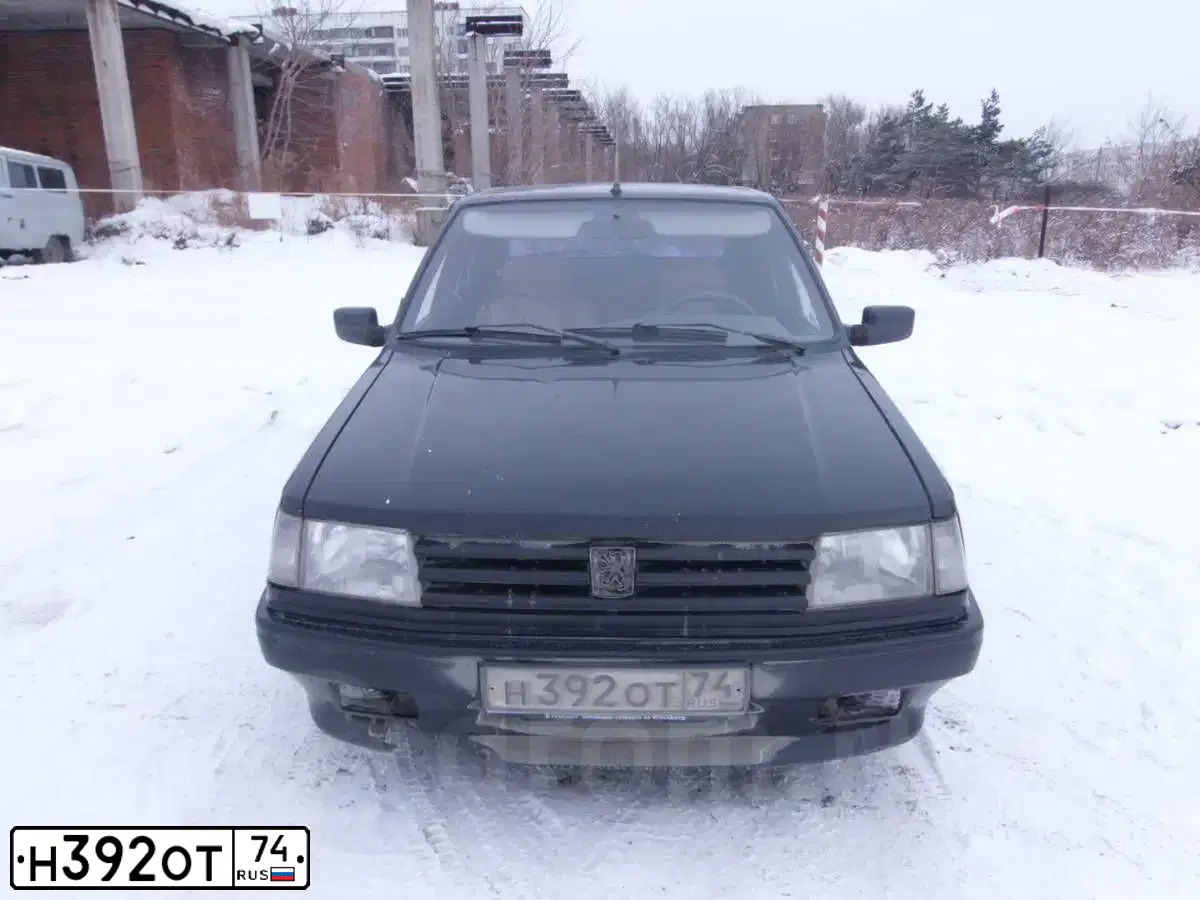 Фото автомобиля PEUGEOT 309, 1992 — госномер Н392ОТ74. Цвет: ЧЕРНЫЙ