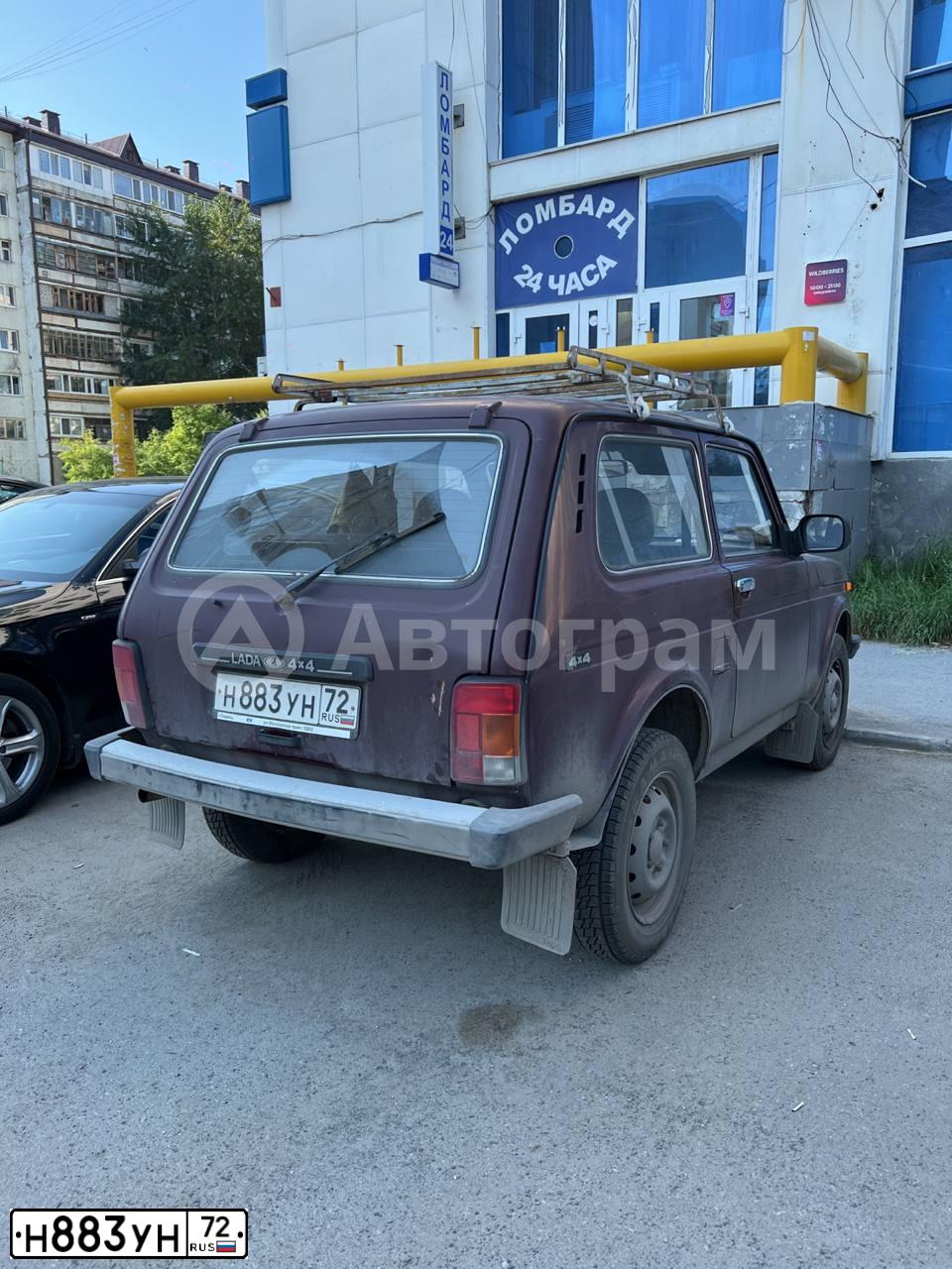 Фото автомобиля LADA 2121 NIVA, 2011 — госномер Н883УН72. Цвет: ТЕМНО-ВИШНЕВЫЙ