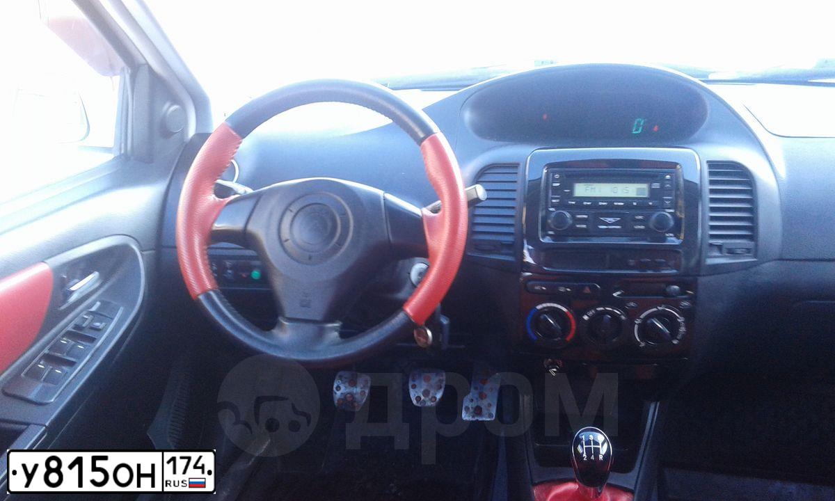 Фото автомобиля GEELY MK CROSS, 2013 — госномер С684ММ39. Цвет: Белый